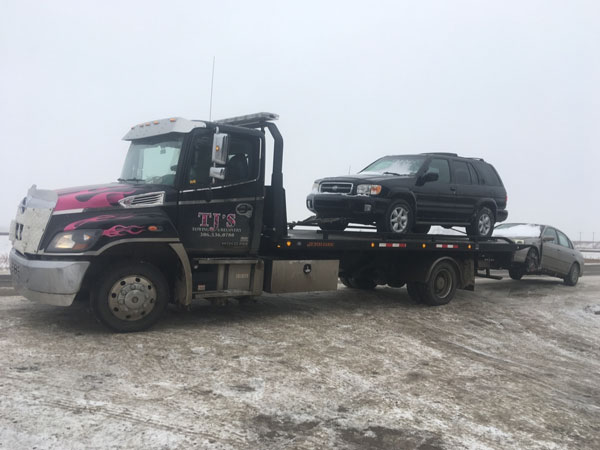 TJ's Towing Two Cars